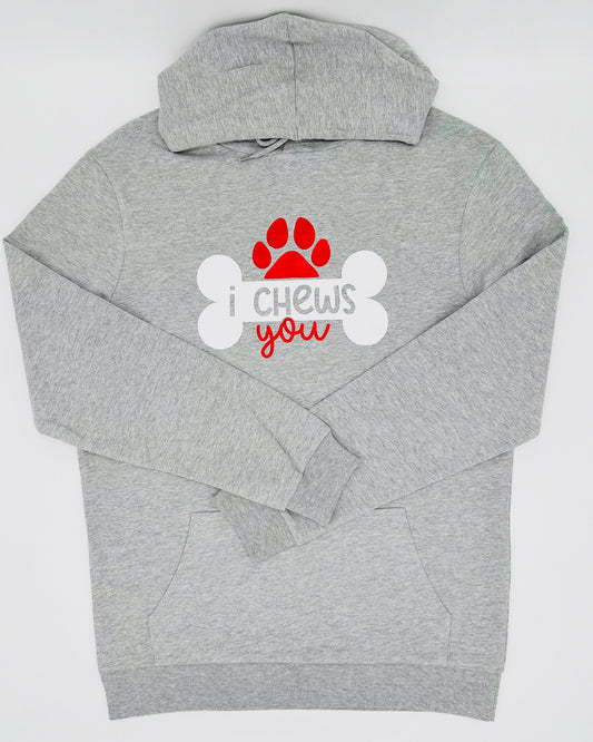 Hoodie in grau meliert. Auf der Brust ist ein grosser Hundeknochen in weiss mit der Aufschrift "i chews". Direkt darunter steht kursiv geschrieben "you" in rot. Ueber dem Hundeknochen ist eine Hundepfote in rot abgebildet.